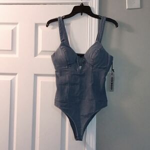 Haute Monde brand size small blue jean body suit.